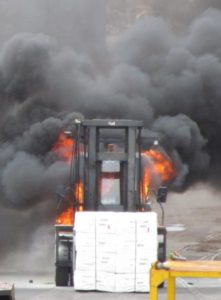 Forklift on fire.