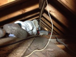 Worker in attic